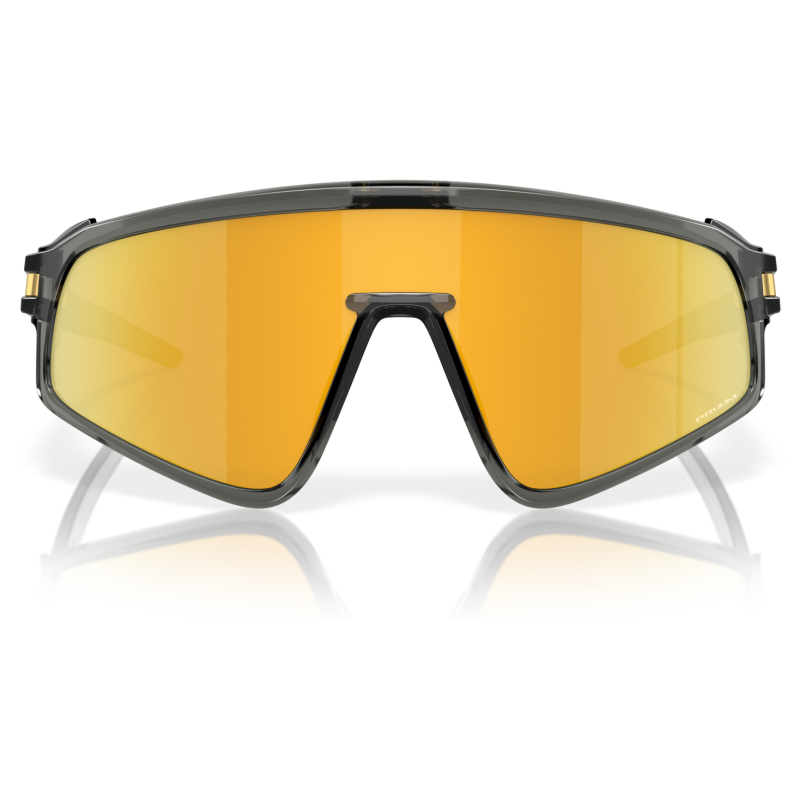 Non conosco le informazioni della pagina dove è caricato. Tuttavia, ho analizzato l’immagine e posso aiutarti con un testo ottimizzato SEO:Occhiali Oakley Sutro Lite Sweep, lenti color arancione, montatura nera, forma a mascherina sportiva riflettente.