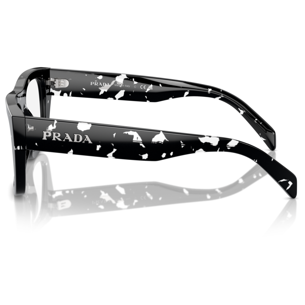 Occhiale da sole Prada modello PR 13YS, con montatura nera e bianca, forma rettangolare, logo Prada visibile.