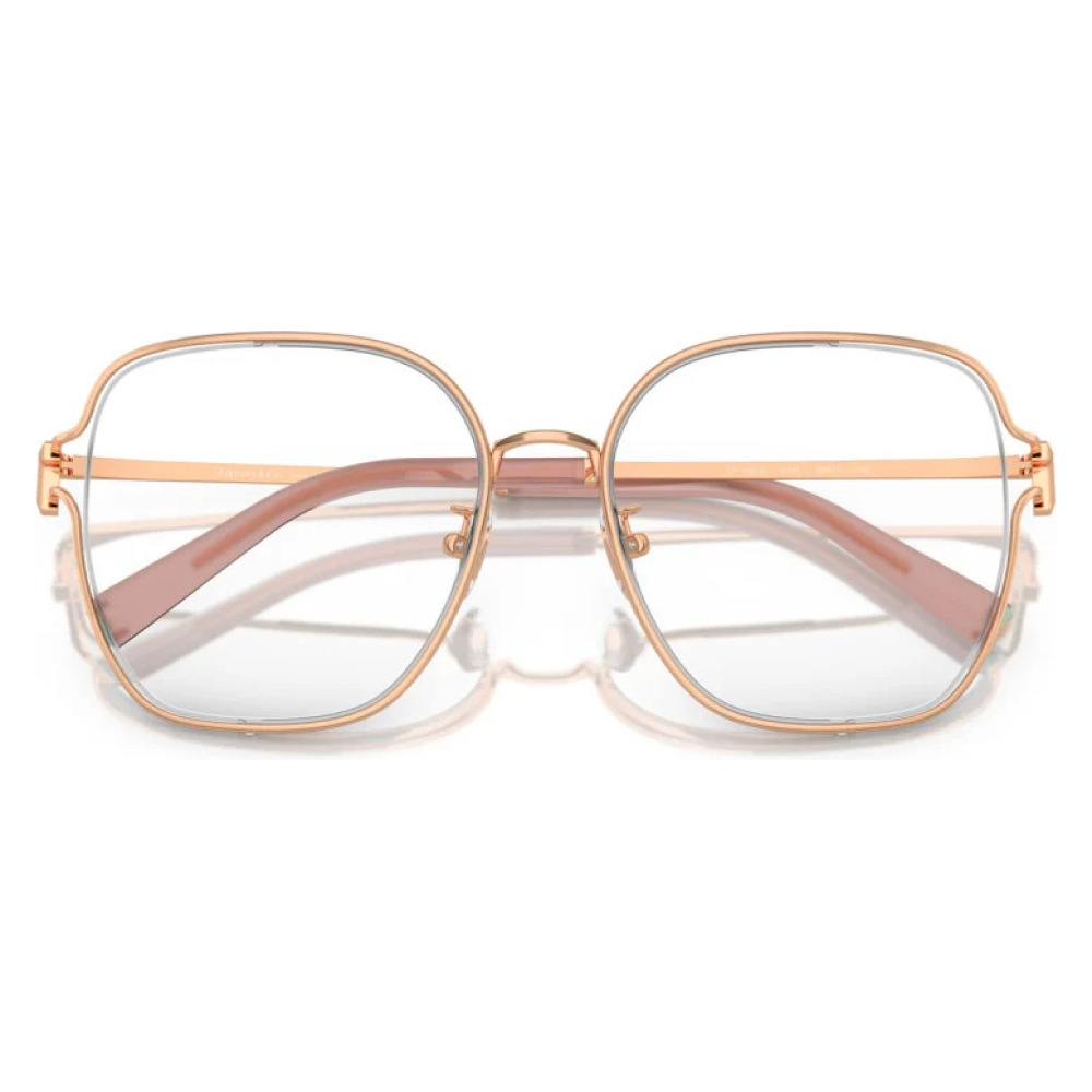 Occhiali Transitions modello TL-P165-C4, colore oro rosa, forma quadrata con montatura in metallo.