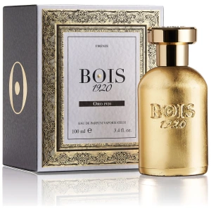 Profumo BOIS 1920 Oro 1920, bottiglia dorata elegante, confezione con dettagli decorativi in oro.