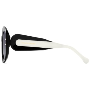 Occhiali Carolina Herrera, montatura nera e bianca, forma arrotondata.
