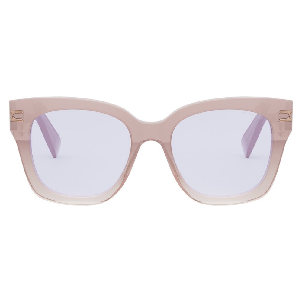 Occhiali Max Mara, montatura rettangolare oversize, colore beige trasparente con dettagli dorati.