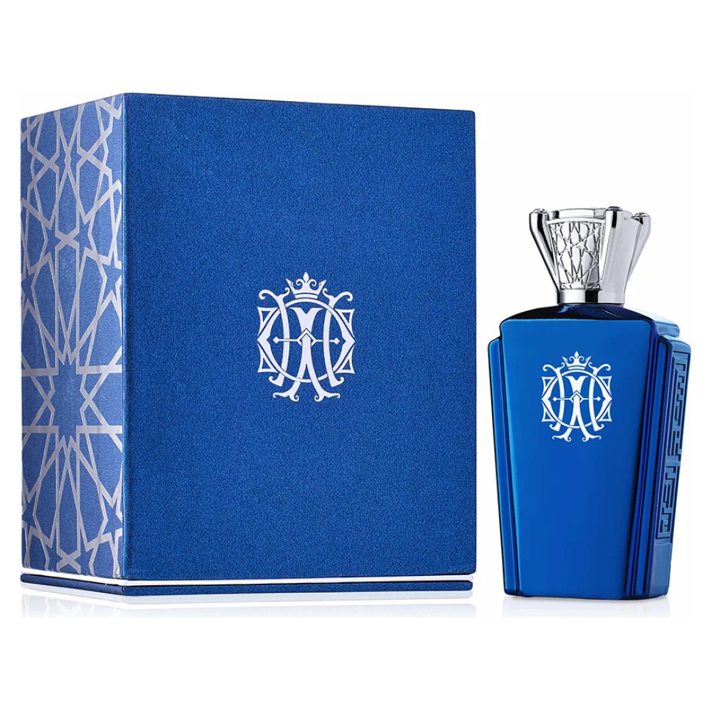 Flacone di profumo blu con dettagli argentati, marchio artistico, confezione coordinata con motivi geometrici.