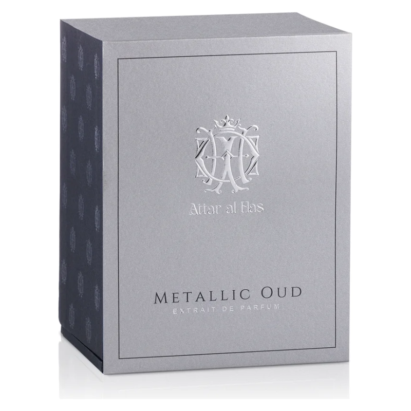 Profumo Metallic Oud di Attar al Has, confezione elegante grigia con logo raffinato.