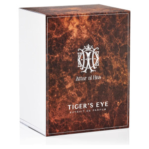 Profumo “Tiger's Eye” di Attar al Has, con confezione marrone, design elegante e logo centrale.