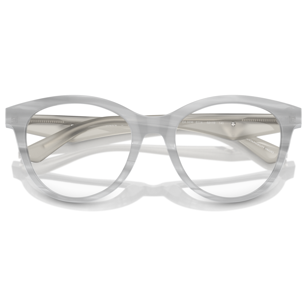 Montatura occhiali trasparente, forma arrotondata, marchio Emporio Armani, design minimalista ed elegante.