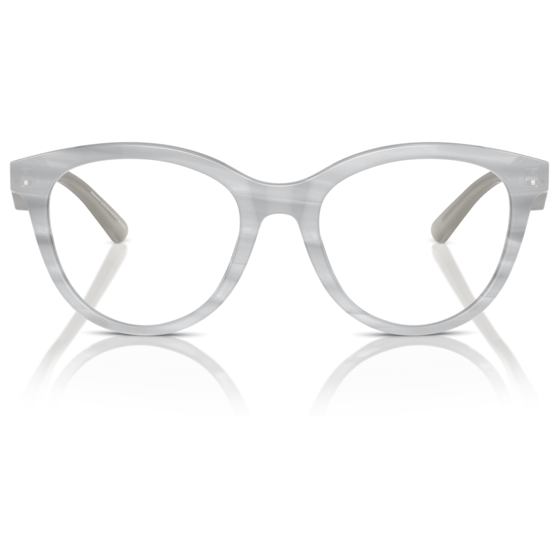 Occhiali da vista con montatura trasparente in acetato, forma tondeggiante. Marchio non visibile.
