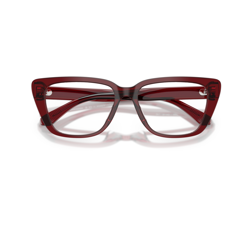 Occhiali cat-eye, montatura spessa rossa trasparente. Marchio non visibile. vintage ed elegante.