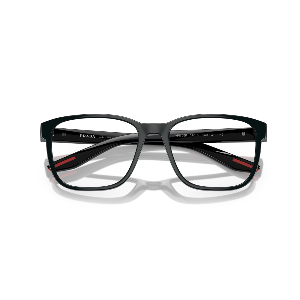 Occhiali Prada, montatura rettangolare, nera con dettagli rossi, dal design moderno ed elegante.