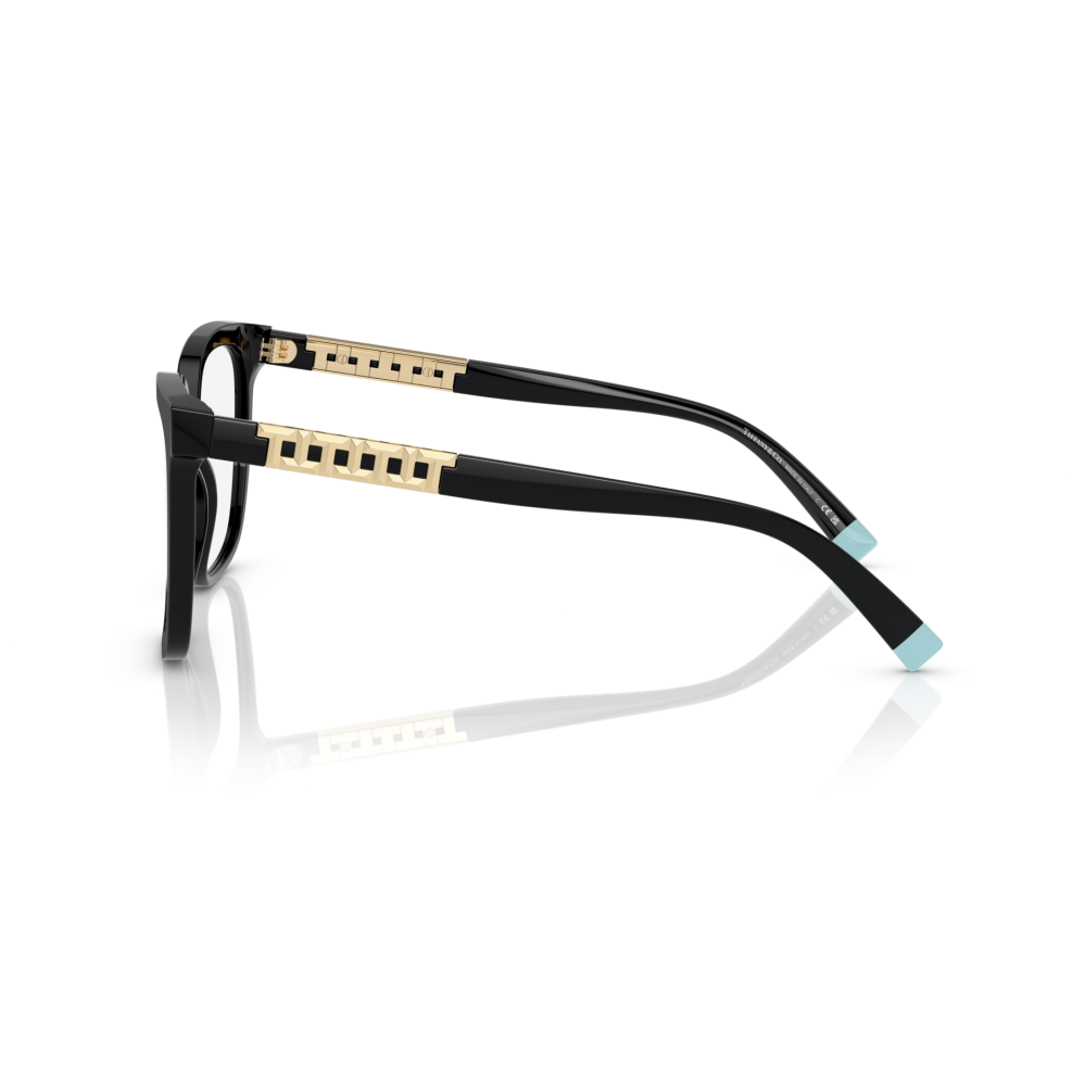 Occhiali Tiffany&Co. con montatura rettangolare nera e dettagli in oro sui lati, punte azzurre.