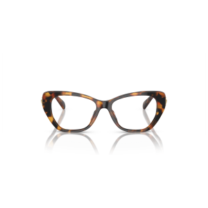 Occhiali cat-eye tartarugati. Montatura spessa marrone con motivo maculato. Marchio non visibile.