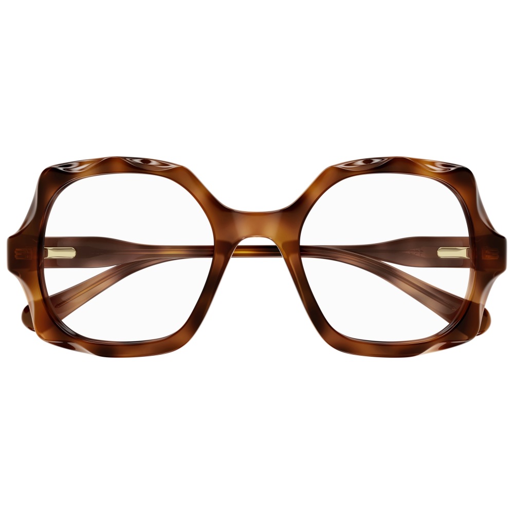 Occhiali oversize, montatura squadrata, marrone trasparente, design elegante. Marca non identificabile.