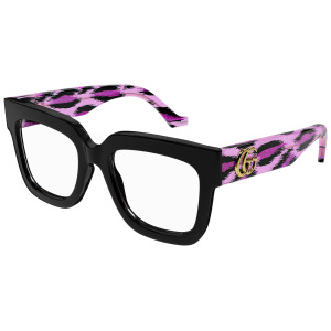 Occhiali Gucci squadrati, montatura nera con aste rosa e motivo zebrato, logo dorato sulle aste.