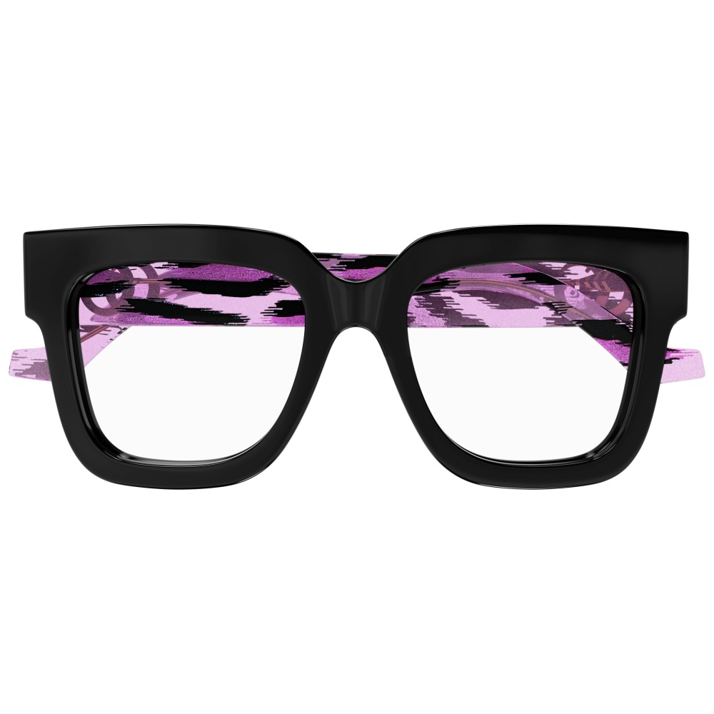 Occhiali dalla montatura nera squadrata con interno fantasia viola nero. Marchio non visibile.