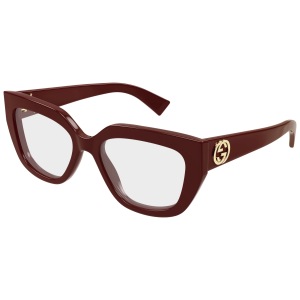 Occhiali Gucci, montatura a farfalla in acetato marrone con logo dorato sulle aste.