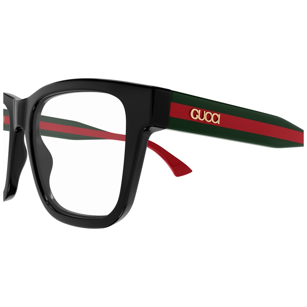 Occhiali Gucci: montatura squadrata nera con aste verdi e rosse, logo dorato.
